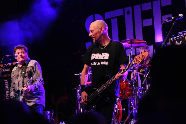 Stiff Little Fingers' bassist Ali McMordie sports the T-shirt of Pompey punks The Dinz during their encore.  Picture by Paul Windsor