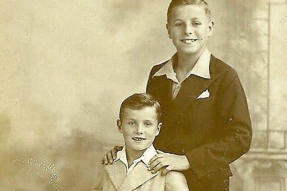 Bobby pictured with his older brother, Ron.