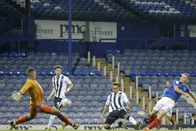 David Wheeler in action during Pompey's first EFL Trophy tie of 2018/19 against Gillingham at a sparse Fratton Park. There will be a few more supporters at the club's final EFL Trophy tie this season ...