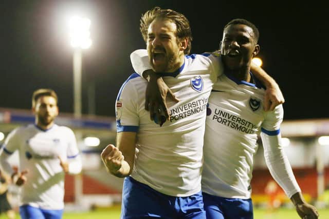 Brett Pitman celebrates scoring on his first-team starting return against Walsall. Picture: Joe Pepler