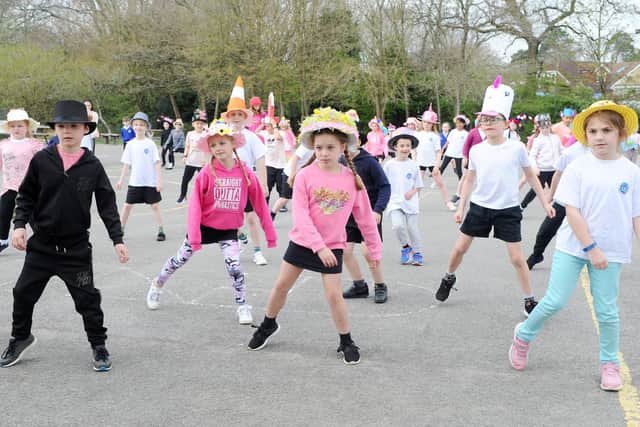 Children in their hats enjoy a Zumba session.

Picture: Sarah Standing (280319-4365)
