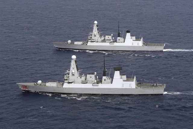 Pictured: HMS Duncan lays side by side with HMS Dragon in the sail past. Photo: Royal Navy