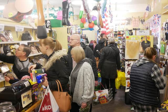 Customers grabbing what they can before U-Need-Us shuts its doors
Picture: Habibur Rahman