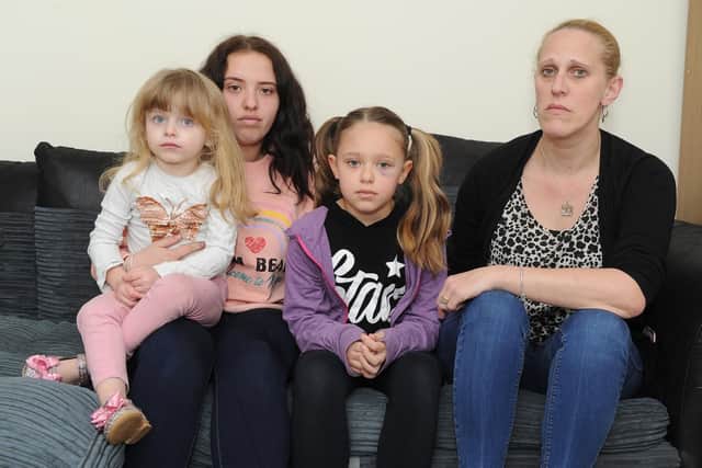 Dharma, four, Chelsea, 16, Tia, nine and their mother Helen Gash at their home in Somers Town, Portsmouth. Picture: Habibur Rahman