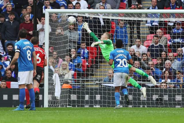 Aiden McGeady's free-kick finds the top corner of the Pompey net Picture: Joe Pepler