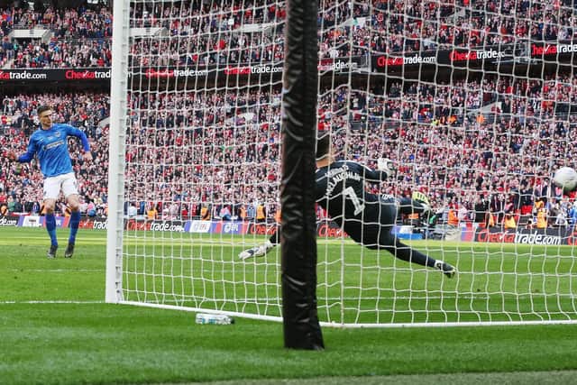Oli Hawkins strikes the penalty which won Pompey the Checkatrade Trophy. Picture: Joe Pepler.