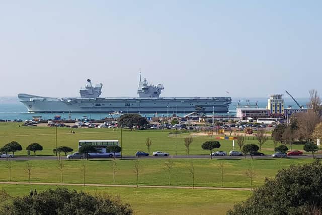 HMS Queen Elizabeth leaving Portsmouth this morning. Picture: Barney Vaux