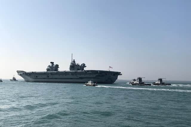 HMS Queen Elizabeth left Portsmouth on Monday morning. Picture: Sarah Standing