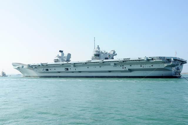 HMS Queen Elizabeth leaving Portsmouth Naval Base on Monday, April and heading up to Rosyth, Scotland, for dry-dock maintenance.Picture: Sarah Standing (010419-4768)