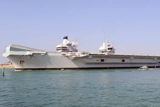 HMS Queen Elizabeth leaving Portsmouth Naval Base on Monday, April and heading up to Rosyth, Scotland, for dry-dock maintenance.

Picture: Sarah Standing (010419-4751)