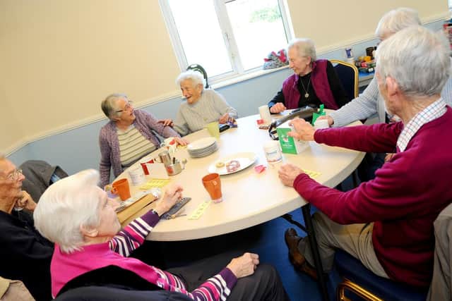 The group taking part in their weekly raffle.
Picture: Sarah Standing (250319-3895)