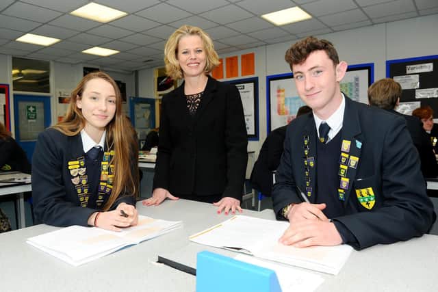 Headteacher Sarah Bennett with head girl Amber Faull, 16, and head boy Samuel Ginn, 15
Picture: Sarah Standing (010419-4918)