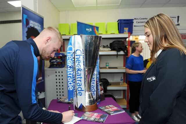 Jack Whatmough, Portsmouth FC player, with Grace Kimpton (14).
Picture: Sarah Standing (020419-4959)