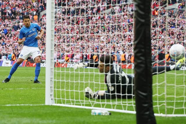 Gareth Evans puts away his penalty in the Checkatrade Trophy final shootout