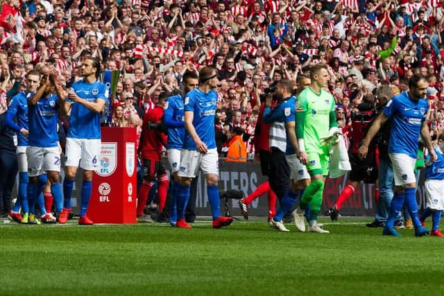 Pompey players head out onto the pitch before kick-off. Picture: Dave Taylor/ LMSMag