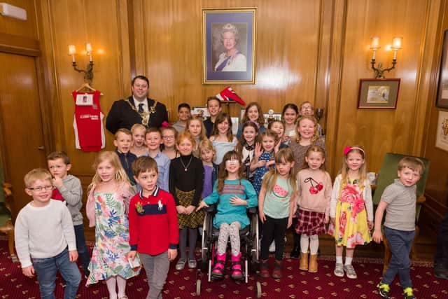 Children's group, Dream Catchers are holding their very own children's parliament at the Guildhall, Portsmouth - Cllr Lee Mason, Lord Mayor of Portsmouth with the Dream Catchers. Picture: Duncan Shepherd