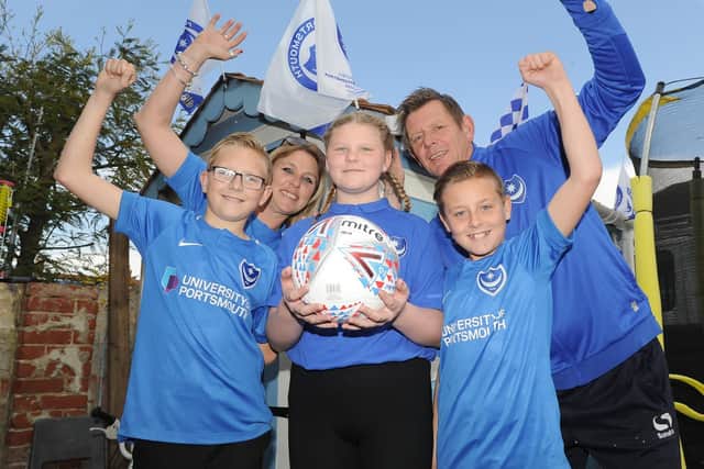 Family of Pompey supporters with Checkatrade final match ball.Mum, Cassie Glover, Billy 11, Lottie 10, Alfie 11 and dad, Darren Glover.

Picture: Habibur Rahman