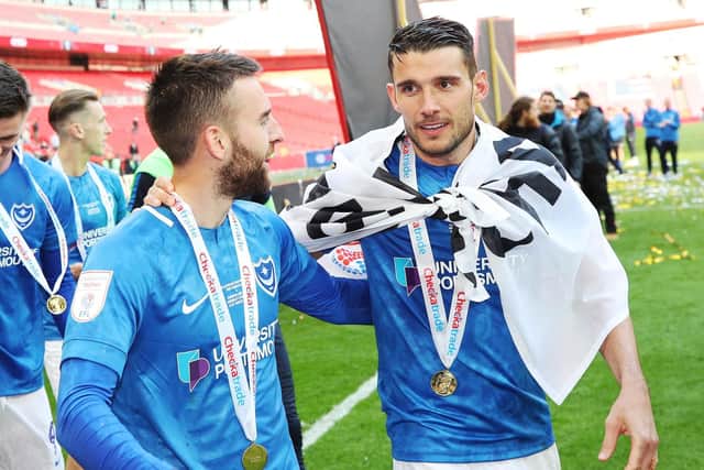 Gareth Evans, right, celebrates Pompey's Wembley triumph with Ben Close. Picture: Joe Pepler