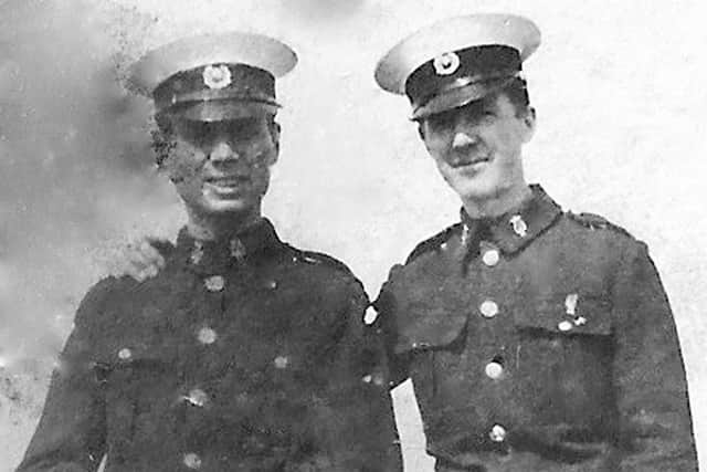 Originally Found between floorboards of a house in Milton, can anyone identify these two Royal Marines?