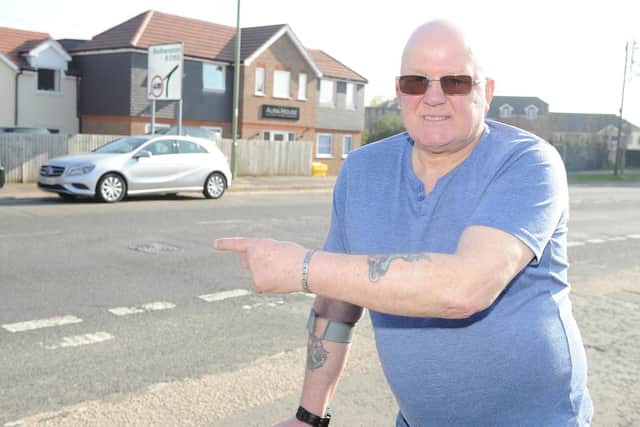 Robert Boniface on New Road, Havant next to the troubling manhole
Picture: Habibur Rahman