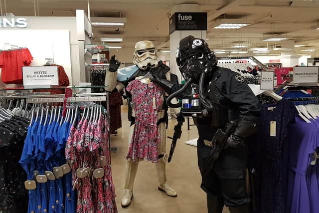 The Pompey Stormtrooper and TIE fighter pilot take a break from fundraising to shop in Debenhams in Southsea.