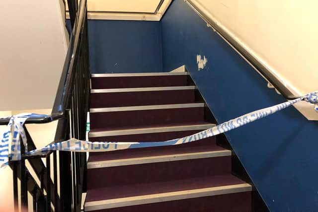 Police cordoned off the stairwell where the stabbing took place