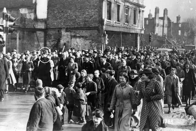 When King George VI and Queen Elizabeth toured the city in 1940 Constable Thomas, circled, was on escort duty.