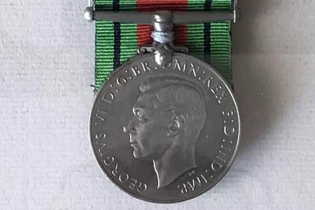 The medal and ribbon awarded to Sydney on order from King George VI