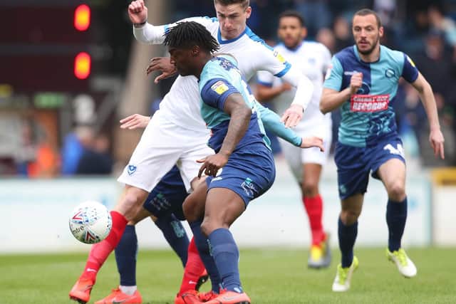 Oli Hawkins battles for the ball