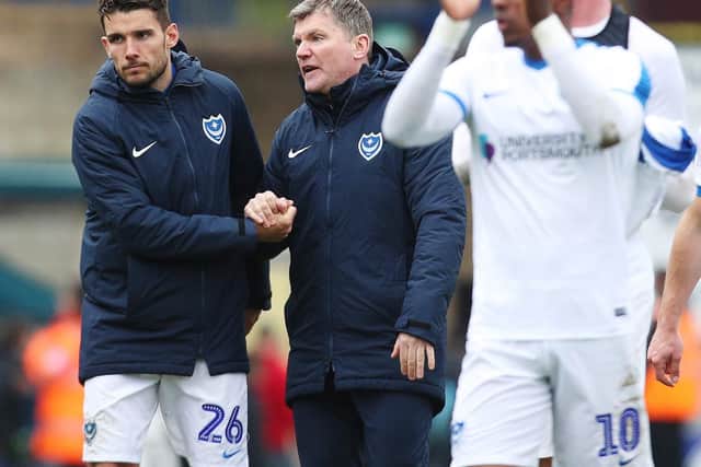 Gareth Evans, left, and Joe Gallen celebrate Pompey's victory at Wycombe. Picture: Joe Pepler