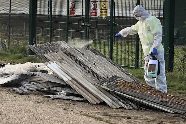 Asbestos being removed from Tanners Lane, off Newgate Lane. Picture: Jim Gildea