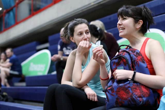 Two friends have a chat during a break at the Danceathon in aid of the Rowans Hospice, at the Mountbatten Centre, Portsmouth. Picture: Chris Moorhouse (070419-16)