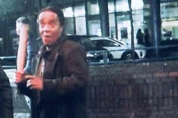 Katiza Cebekhulu with a baseball bat in Guildhall Walk, Portsmouth. He was previously caught with a meat cleaver in Southsea 
Courtesy of CPS Wessex