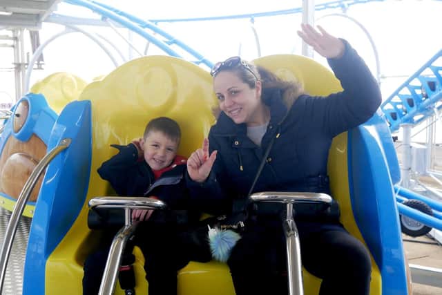 Gemma McKenzie and Afie 6 on the Tidal Wave rollercoaster in Southsea. Picture: Habibur Rahman