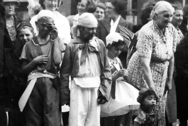 Pirates invade Napier Road, Southsea. A final photograph from John Deans's collection from the 1953 coronation. John is the pirate on the right.