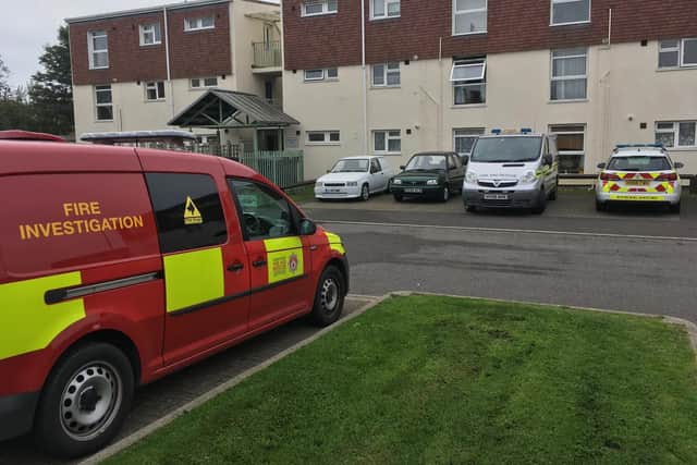 Forensic examiners at the block of flats in Jervis Drive, Gosport, on October 24