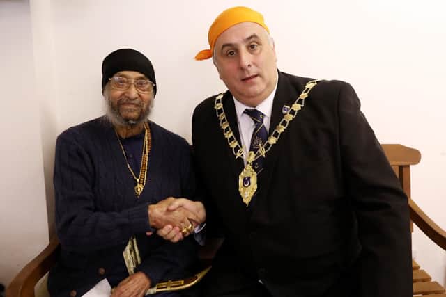 Mr Singh is congratulated by Deputy Lord Mayor of Portsmouth, Cllr David Fuller. Picture: Chris Moorhouse (120419-11).