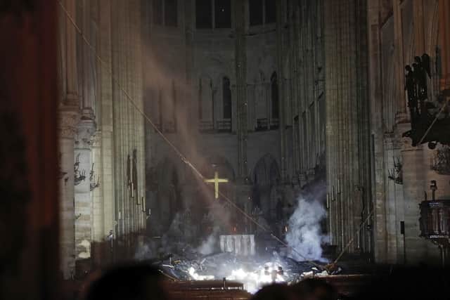 The inside of Notre-Dame has been devastated by the catastrophic fire. Picture: (Philippe Wojazer/Pool via AP)