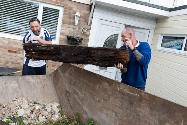 Dan Knight and Mike Symes helping out. Picture: Duncan Shepherd.