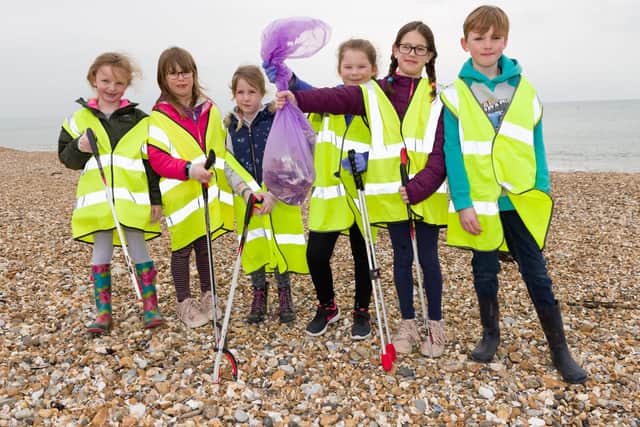 (L-R) Isla Hockaday (6yrs), Lucie Goodman (6yrs), India Hockaday (7yrs), Lily Dewar (7yrs), Freya Goodman (9yrs), Noah Hockaday (8yrs). World Water Day event - Local school kids have been collecting plastic and created sculptures,  on display in the pub. There was also a beach clean litter pick, face painting and an indoor rowing machine competition. Picture: Duncan Shepherd