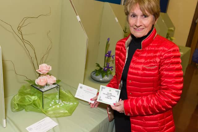 The Hayling Island Horticultural Society has more than 800 numbers and is gearing up to put on its Spring Show for 2019.  Members create floral displays  enjoyed by visitors, and judged by Cllr Peter Wade, Mayor of Havant - Iris Cottle and her entry for the 'Tranquillity' category of the floral art competition. This piece was awarded 1st prize and overall 'Judges Choice'.
Picture: Duncan Shepherd