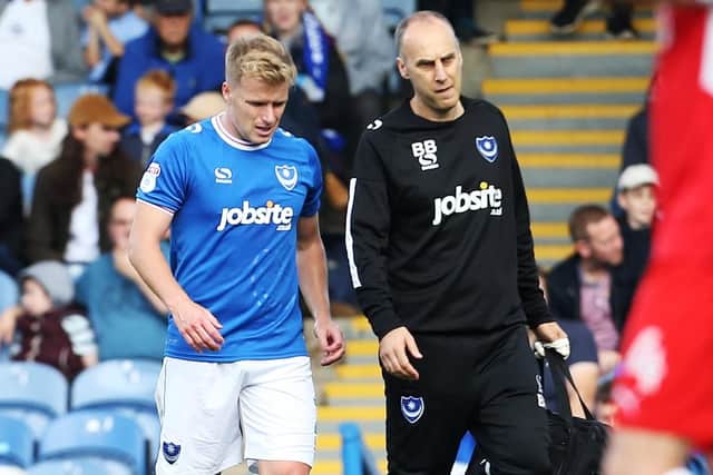 Damien McCrory limps off against Fleetwood. Picture: Joe Pepler