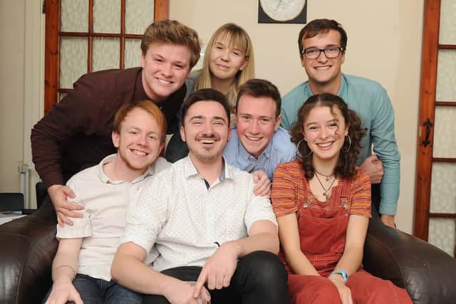 Anthony Davies (centre) at home in Fratton with other cast members from the  musical.

Picture: Habibur Rahman