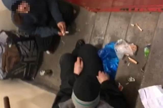 A video shot at Idsworth House in Craswell Street shows two drug addicts with needles, blood covered rags, and litter strewn around them.