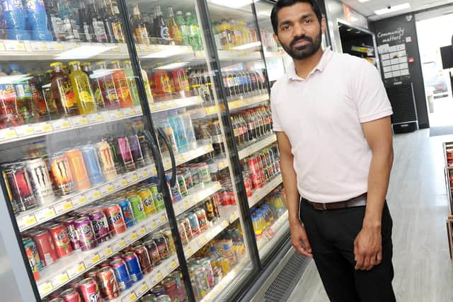 Imtiyaz Mamode next to the chilled drinks where a can of Monster energy drink was stolen. Picture: Sarah Standing (190419-6289)
