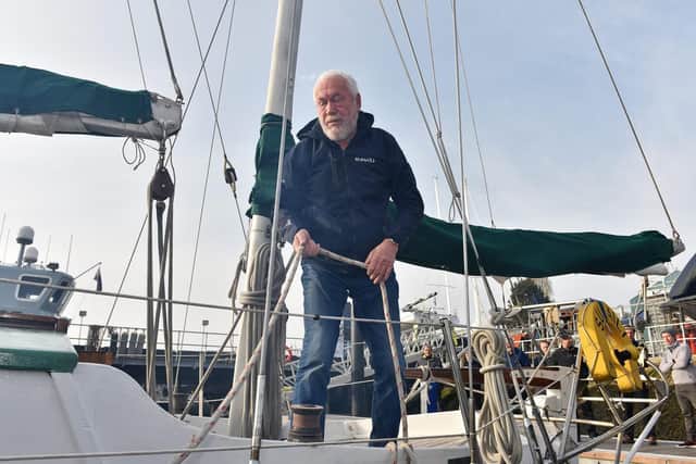 PICTURED TODAY THURSDAY 18TH APRILPictured: Sir Robin poses for the camera onboard Suhaili before departing from Portsmouth Harbour this morning.A British sailor who completed the first non-stop solo sail around the world today returned to the water in the same boat he completed the incredible feat in to celebrate its 50th anniversary.  Sir Robin Knox-Johnston smiled and waved to a crowd of well wishers who gathered to help kick start a weekend of celebrations to mark his amazing achievement.The sailor set off from Portsmouth Harbour, Hants, today in the 32-foot long ketch Suhaili, having lovingly restored it five decades after he circumnavigated the world on her.  Sir Robin and a flotilla of six other boats set sail for Falmouth, Cornwall, where he started and finished his amazing journey in 1969.  SEE OUR COPY FOR MORE DETAILS. Morten Watkins/Solent News & Photo AgencyUK +44 (0) 2380 458800