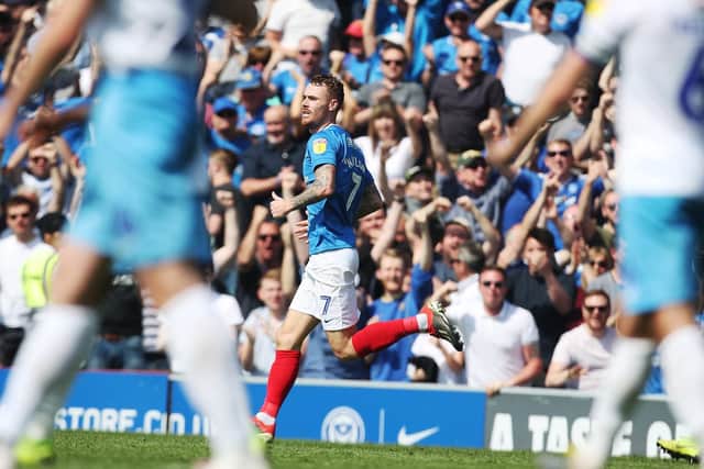 Tom Naylor and the Pompey fans celebrate