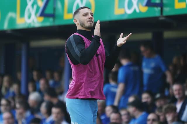 Conor Chaplin, seen here applauding the Fratton faithful on his return, is convinced Pompey will win promotion this season. Picture: Joe Pepler