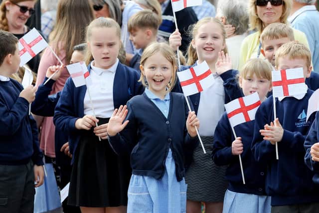 The annual St George's Day parade took place in Emsworth on Tuesday, April 23. More than 60 veterans were joined by serving soldiers from Thorney Island and school children. Pictured is: (middle) Emily Matthews (8) from Emsworth Primary School. Picture: Sarah Standing (230419-5637)