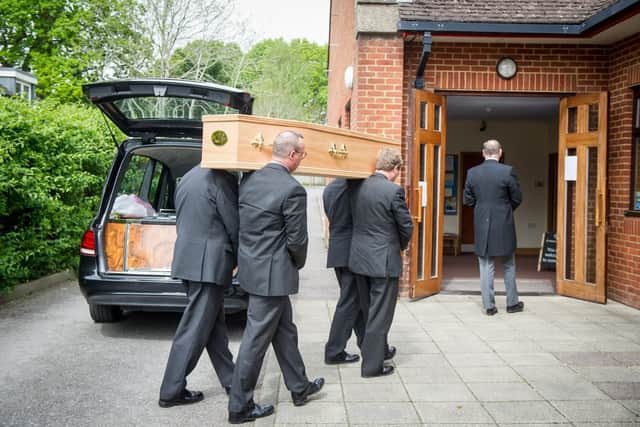 Pallbearers carrying the coffin into the church
Picture: Habibur Rahman